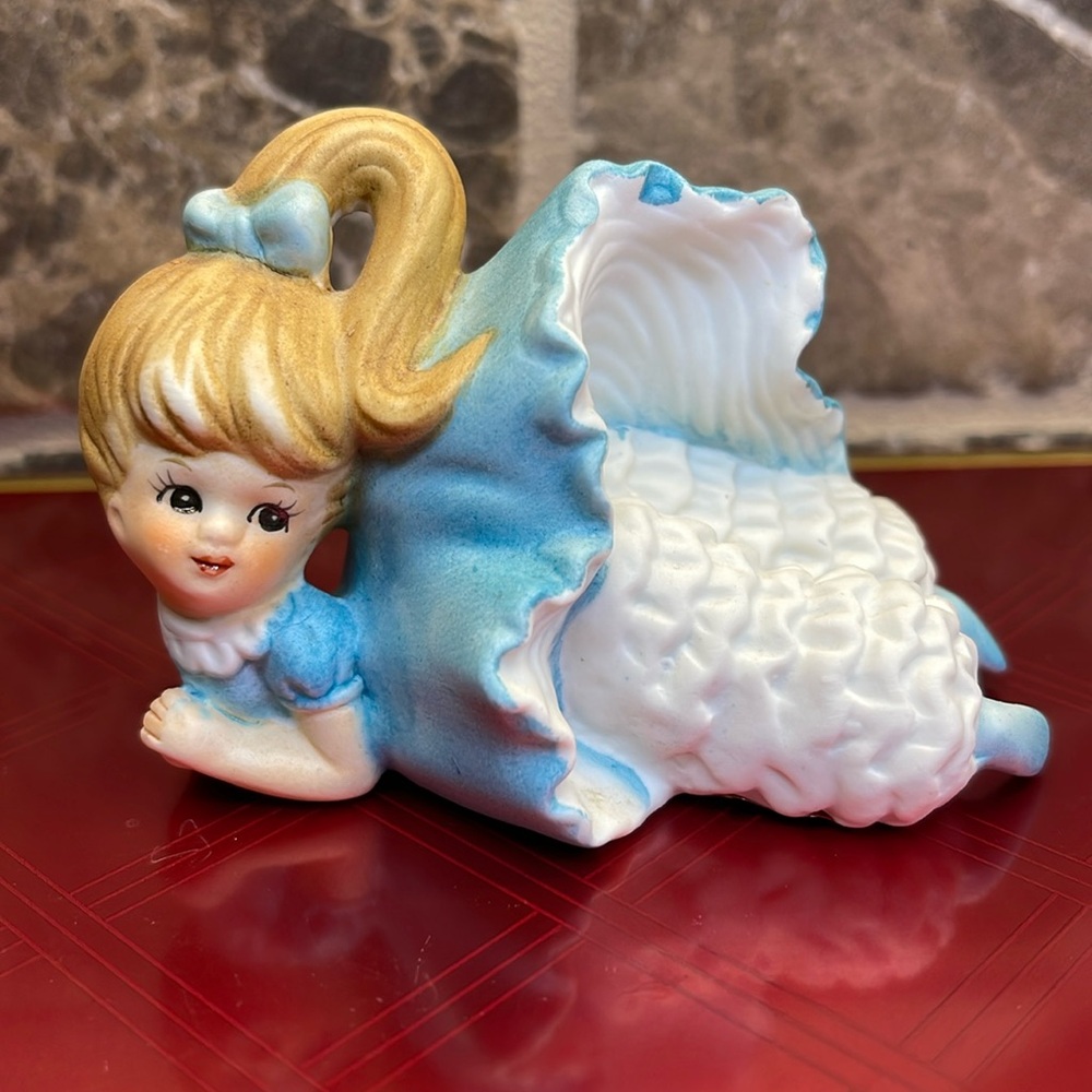 Little GIRL IN BLUE AND WHITE FIGURINE. I HAVE TREASURED HER SINCE THE 1970’s.
